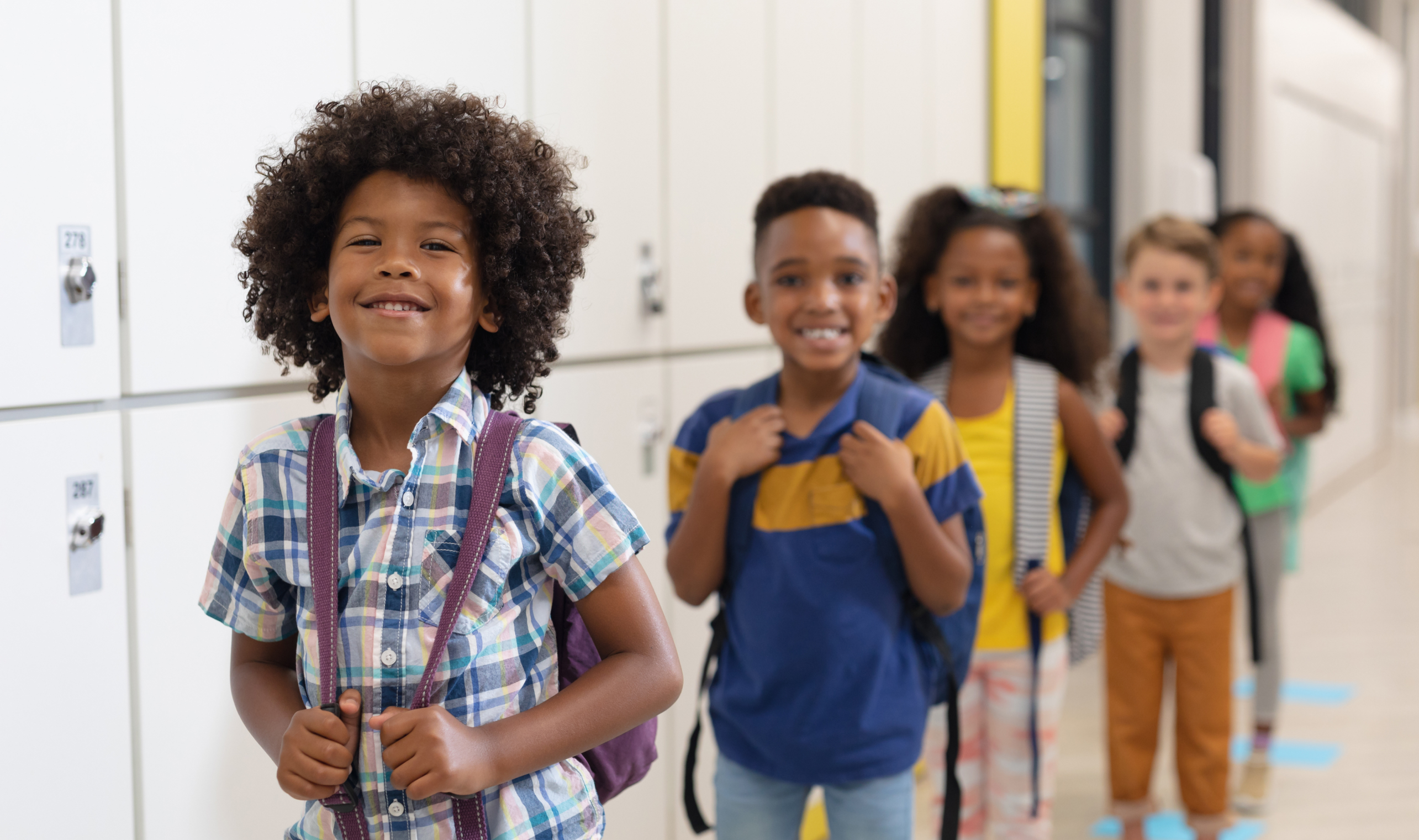 Back To School Kids in line in a school hallway