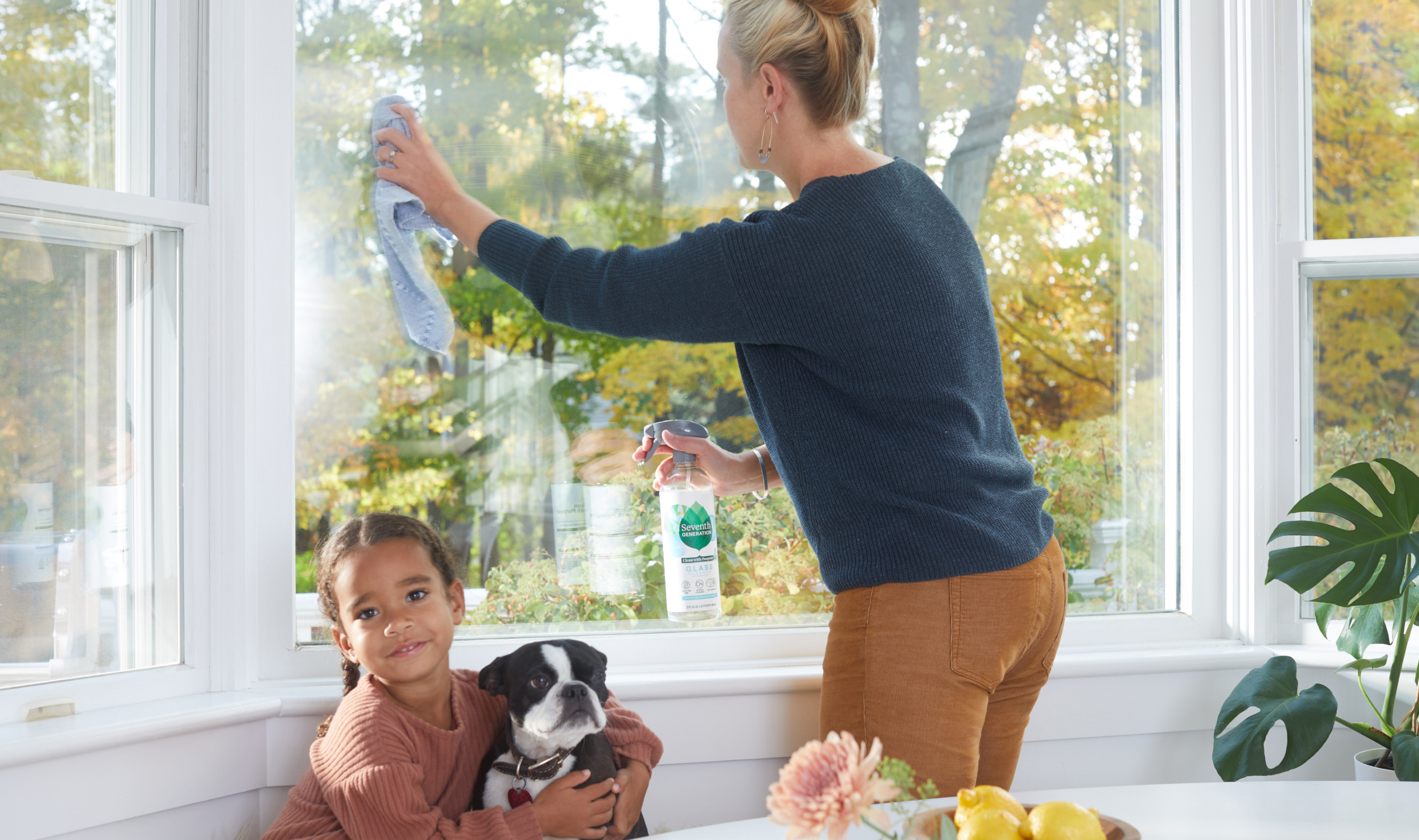 Woman washing window