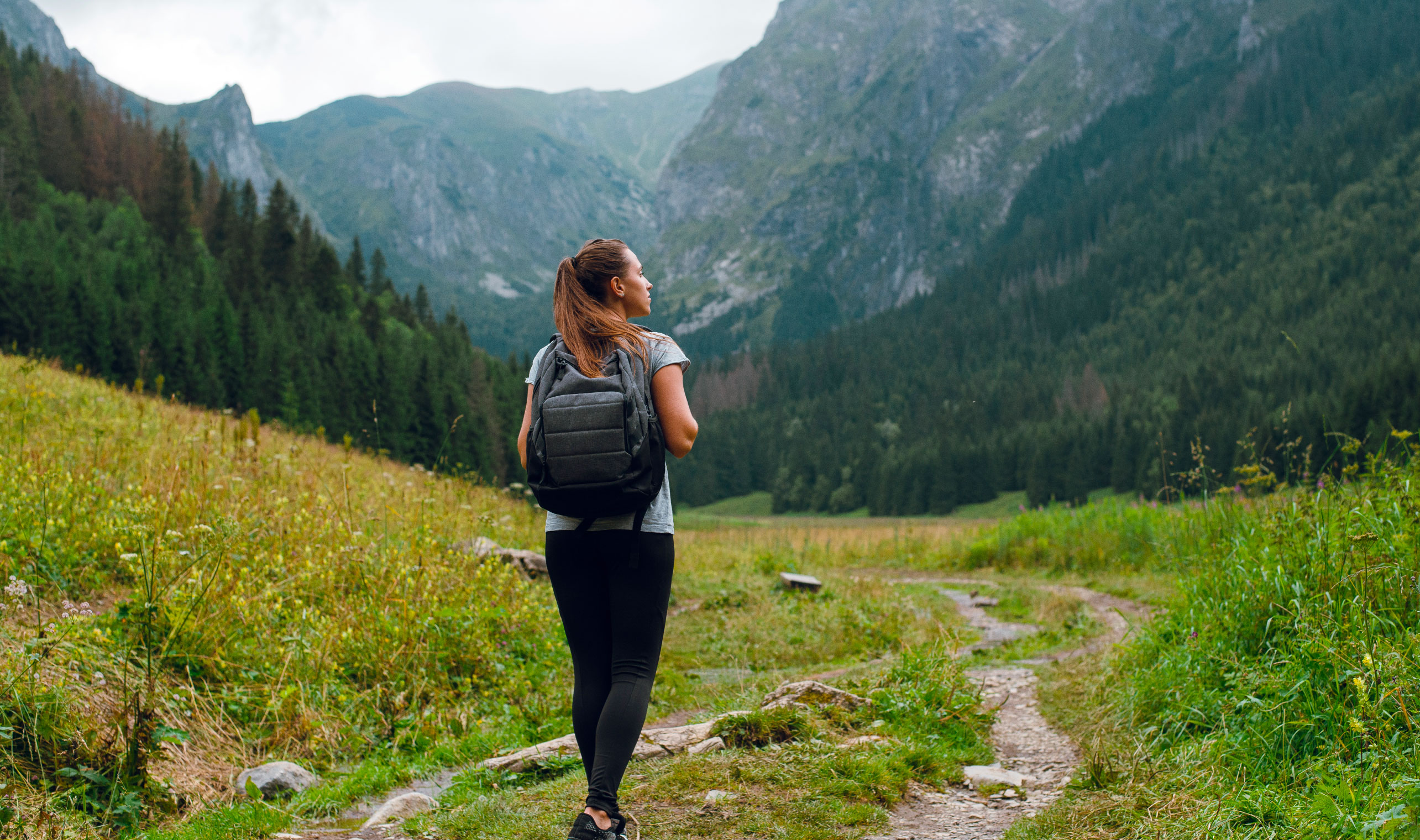 Person hiking in mountains