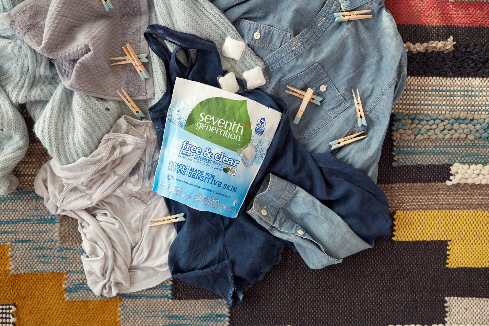 Seventh Generation Laundry Detergent Packs - Free &amp; Clear on a pile of Laundry