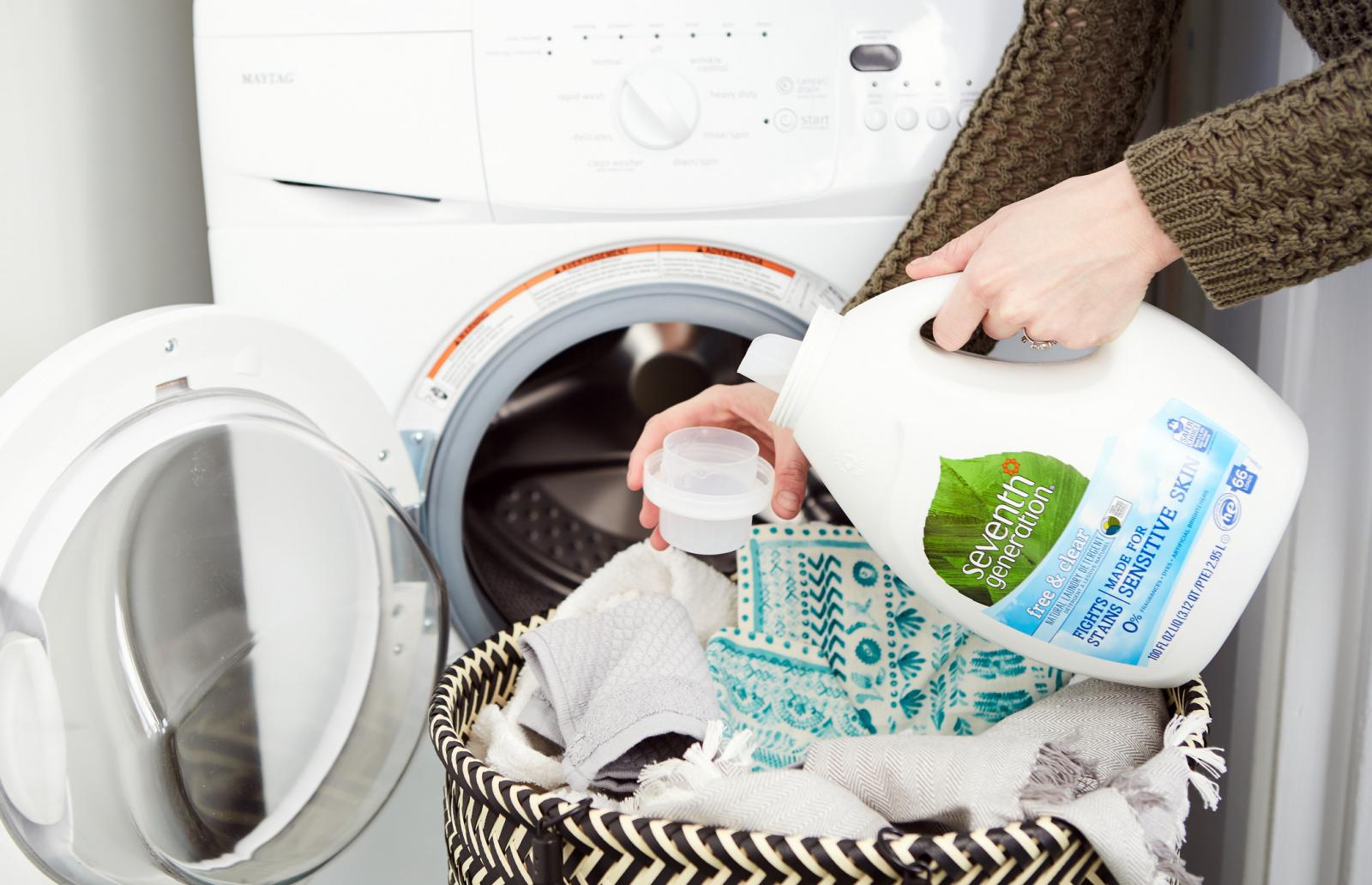 Free and Clear Laundry Pouring into Cap