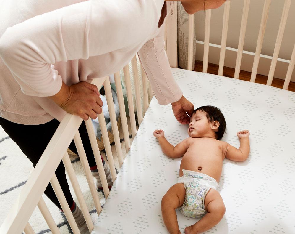 Baby sleeping in crib