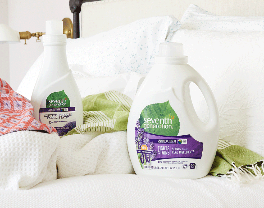 Laundry Detergent Bottles Sitting on Bed