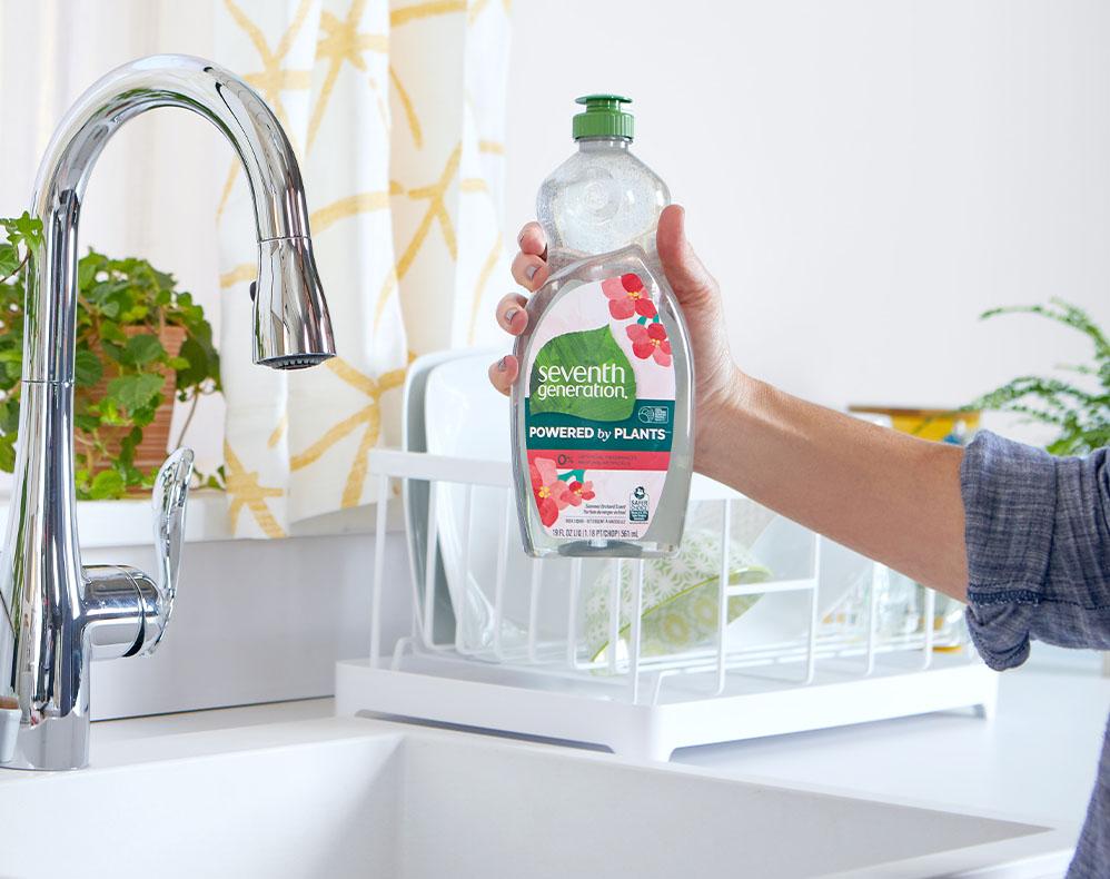 person holding seventh generation hand dish summer orchard scent