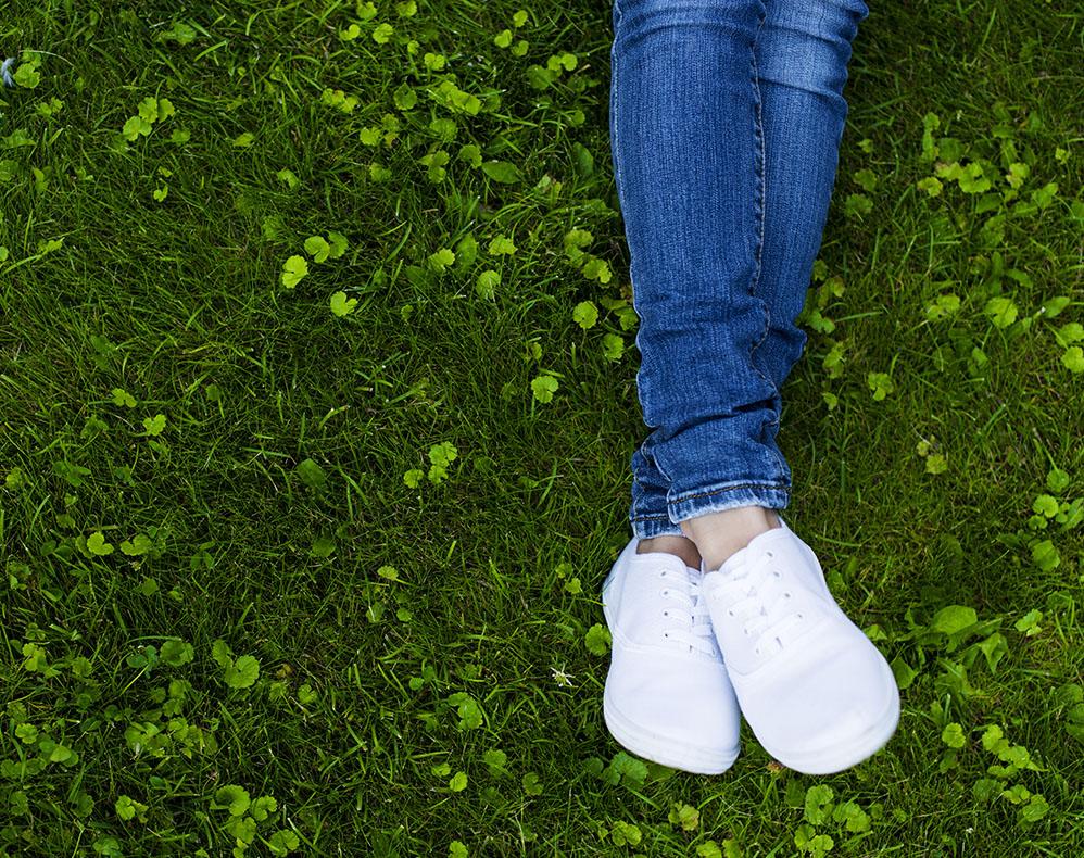 Person Wearing White Shoes