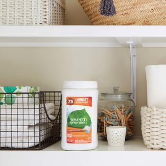 Laundry Detergent Packs - Fresh Citrus and Sandalwood container on laundry room shelf