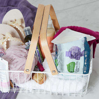 Seventh Generation pads in a bathroom caddy 