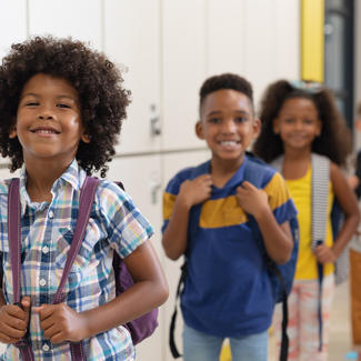 Back To School Kids in line in a school hallway