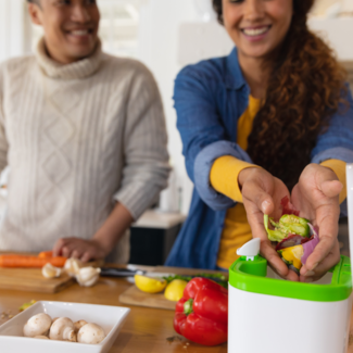 Working in kitchen and composting.