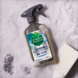 Foaming Dish Spray Free and Clear bottle in soapy sink