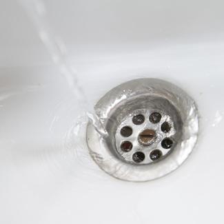 Water running down a drain