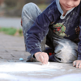 Child Drawing with Chalk