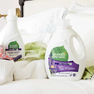 Laundry Detergent Bottles Sitting on Bed