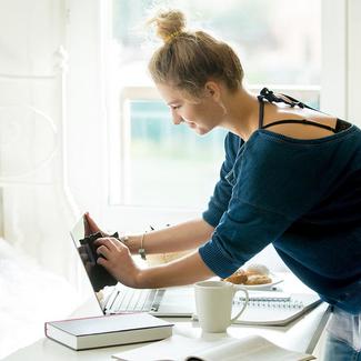 Woman in her dorm room