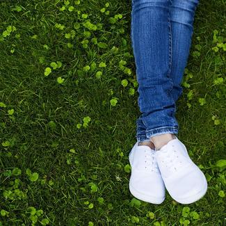 Person Wearing White Shoes