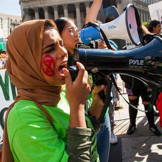 Protester yelling into megaphone