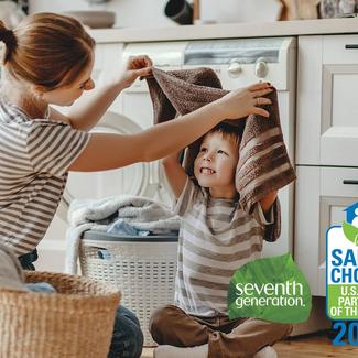 Safer Choice Partners of the Year 2021 - Adult and Child folding/playing in laundry