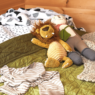 Stuffed Animal Laying on Bed