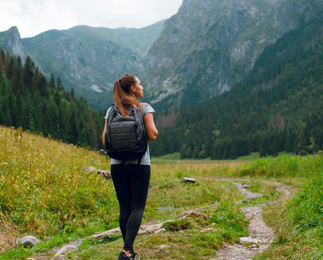 Person hiking in mountains