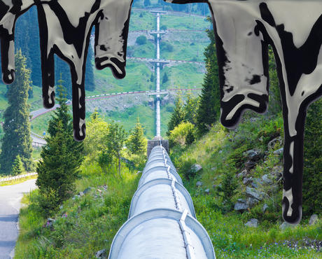 Pipeline cutting through landscape, with oil overlay