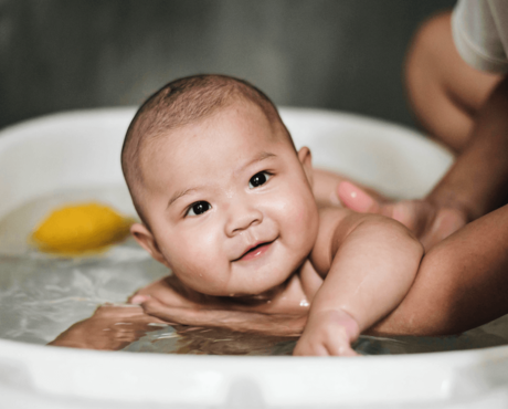 Mother Bathing Baby