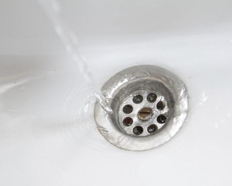 Water running down a drain