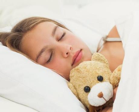 Teenage Girl Sleeping with Teddy Bear