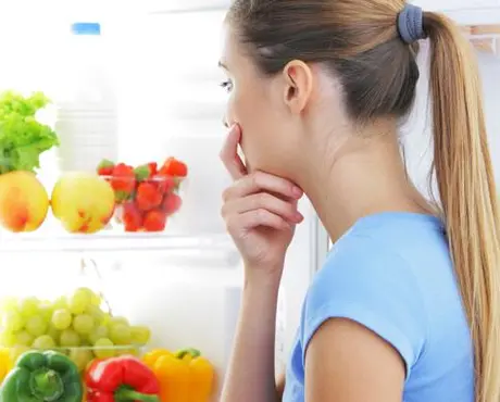 Woman Looking in Refrigerator