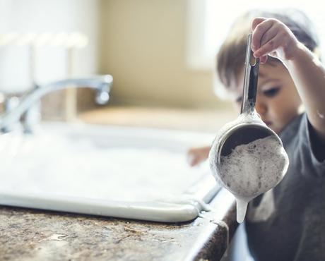 Child Washing Dishes