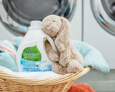 Seventh Generation Laundry Detergent with a Pile of Clothes