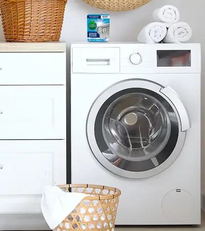 Seventh Generation Washing Machine Cleaner Pack on top of Washing Machine