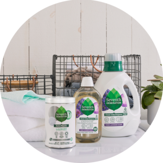 Seventh Generation 90oz, EasyDose, and Zero Plastic Laundry Detergents sitting on a washing machine