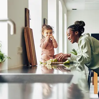 How We Innovate - Mom and child in kitchen