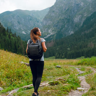 Person hiking in mountains