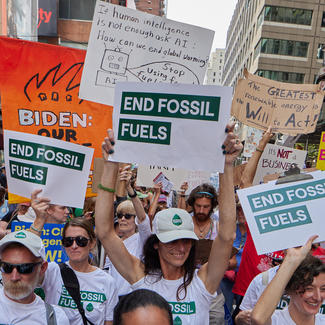 2023 March to End Fossil Fuels - Marchers with Signs