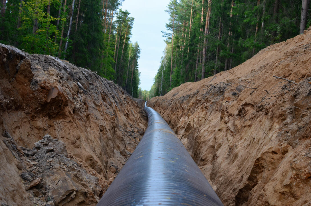 Pipe Line in ditch through forest